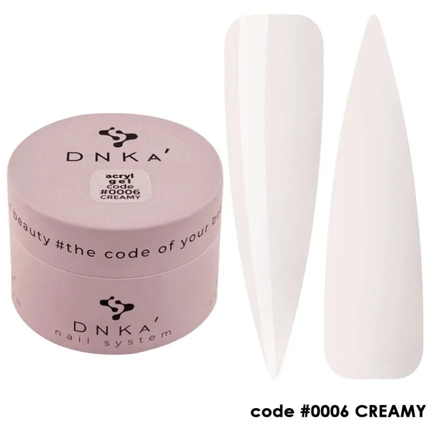 A product image featuring a container labeled DNKa' Acryl Gel in shade #0006 Creamy, alongside a model nail showing the gel applied on it.