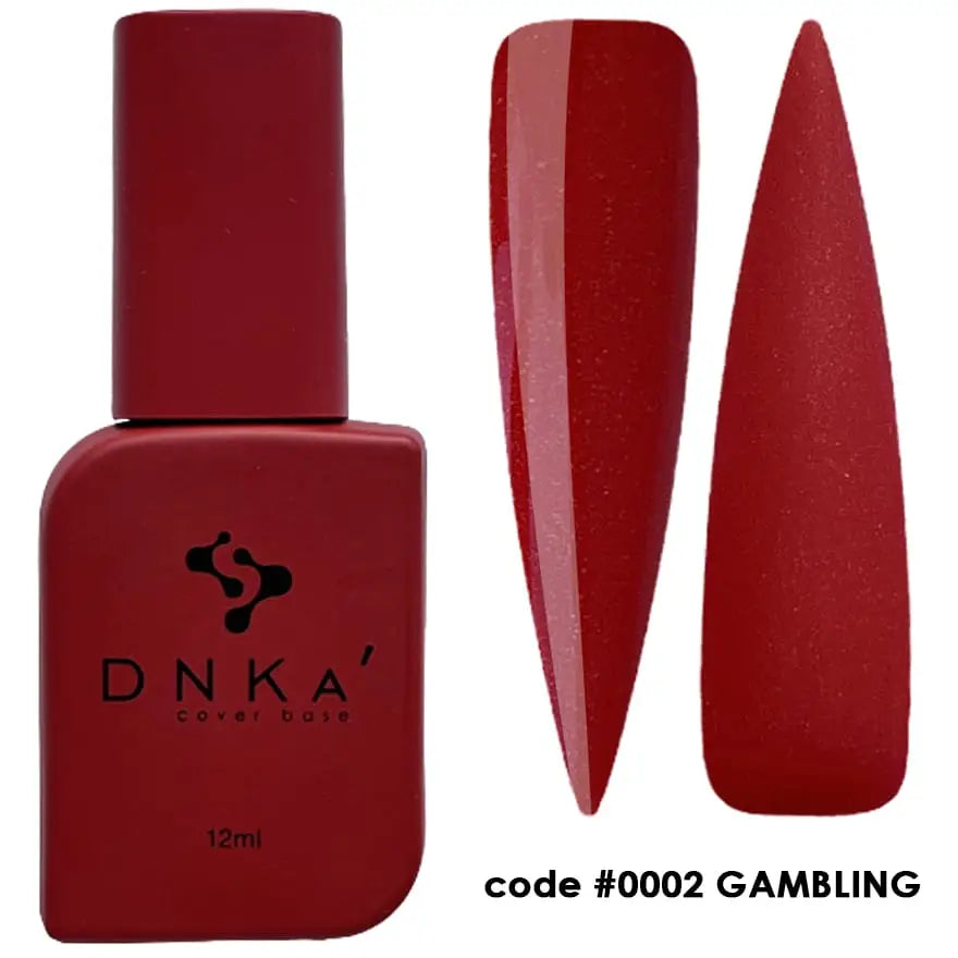 A bottle of DNKa' Cover Base in a fiery red color, with a showy, glossy finish. The code #0002 Gambling is visible on the bottle.
