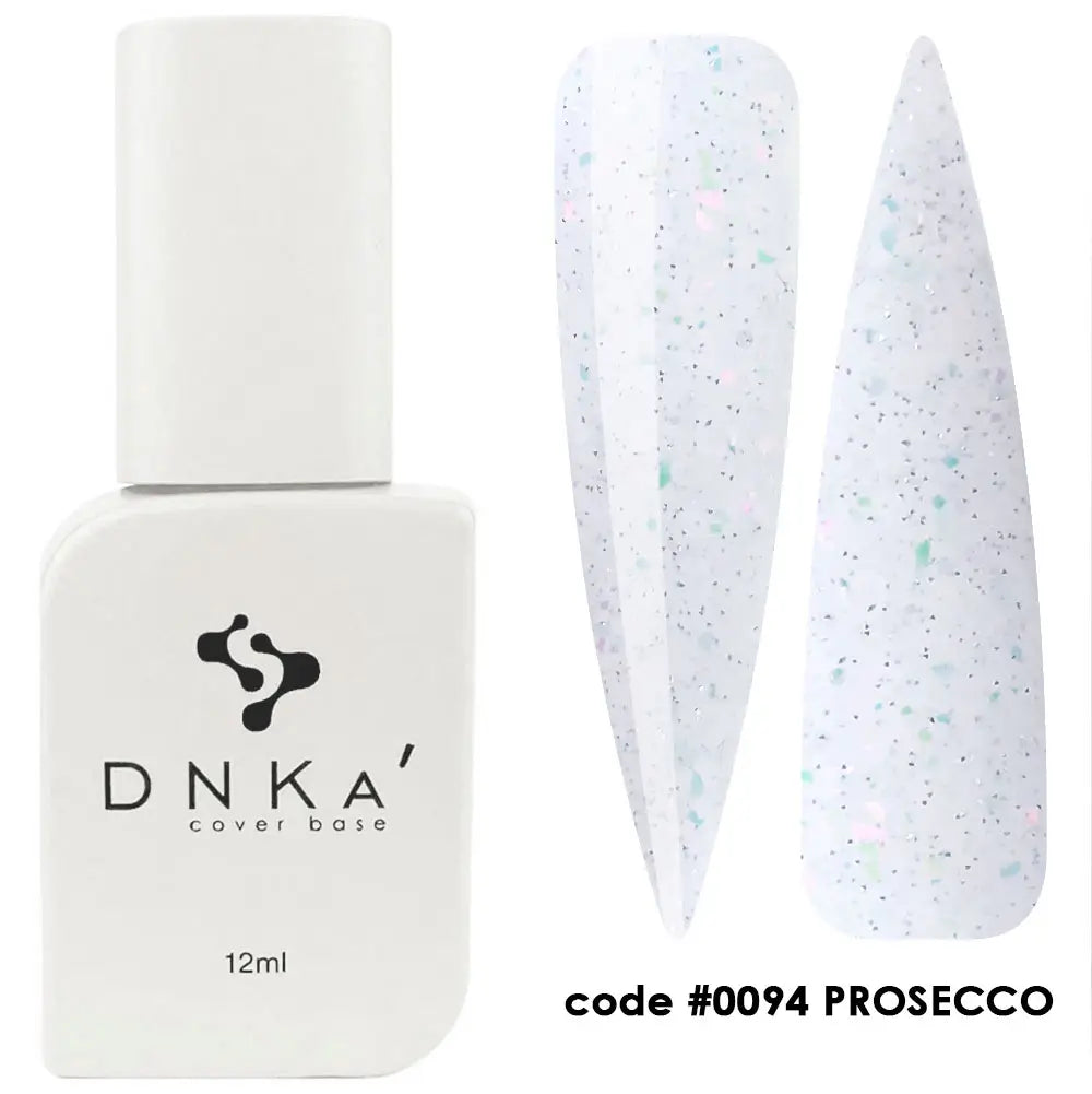 A bottle of DNKa' Cover Base Prosecco 0094 with a capacity of 12 ml, displaying a white and pink glittery color, indicating a sparkly or shimmering finish.