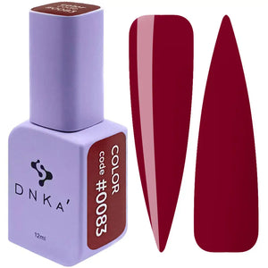 A purple DNKa' Gel Polish bottle with the cap removed, showing a maroon-colored gel polish inside, and two maroon-colored gel polish strips beside it. 0083 color