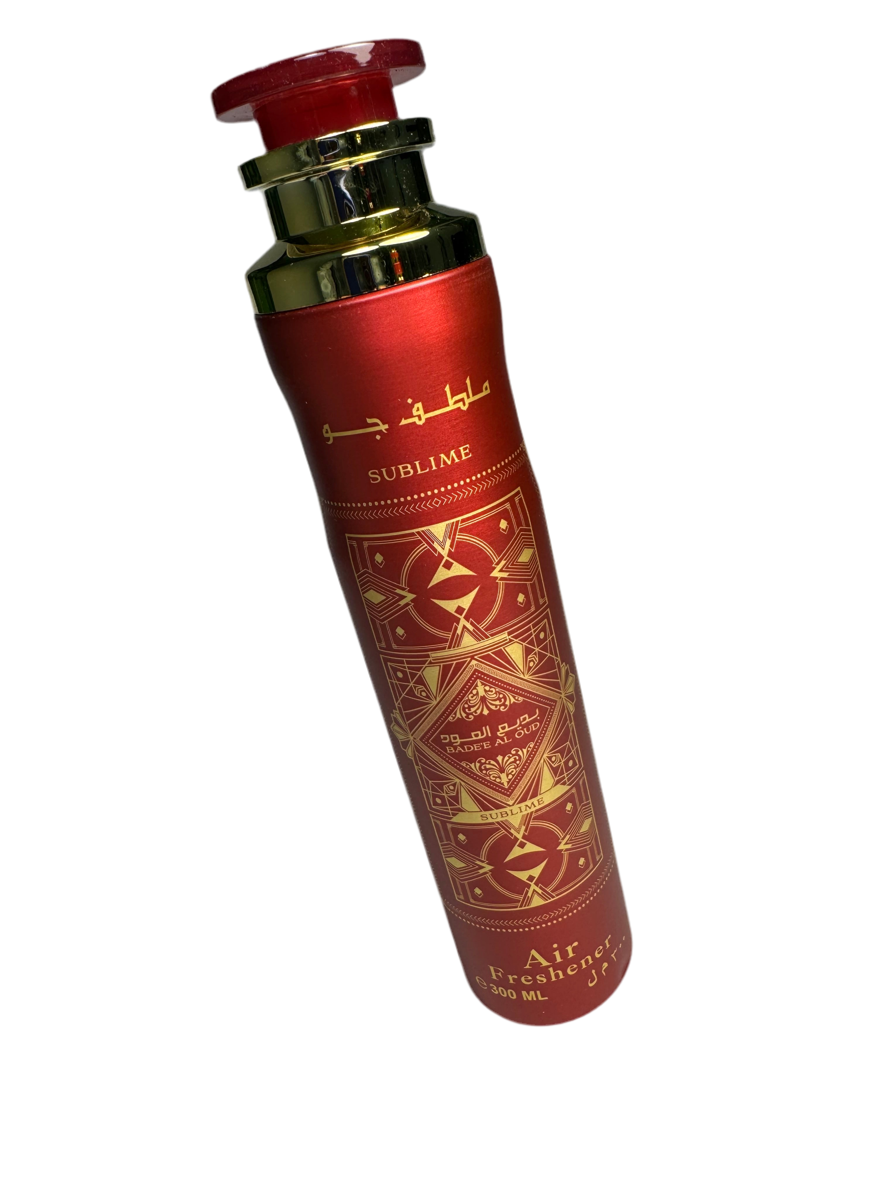 Red perfume bottle with gold accents on a white background