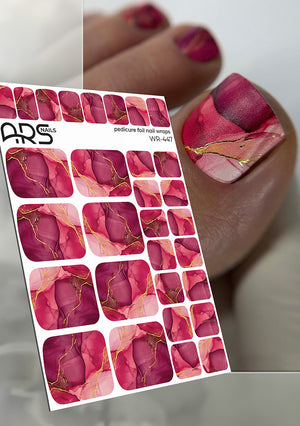 Sheet of pink and gold nail art stickers with a close-up of applied nails.