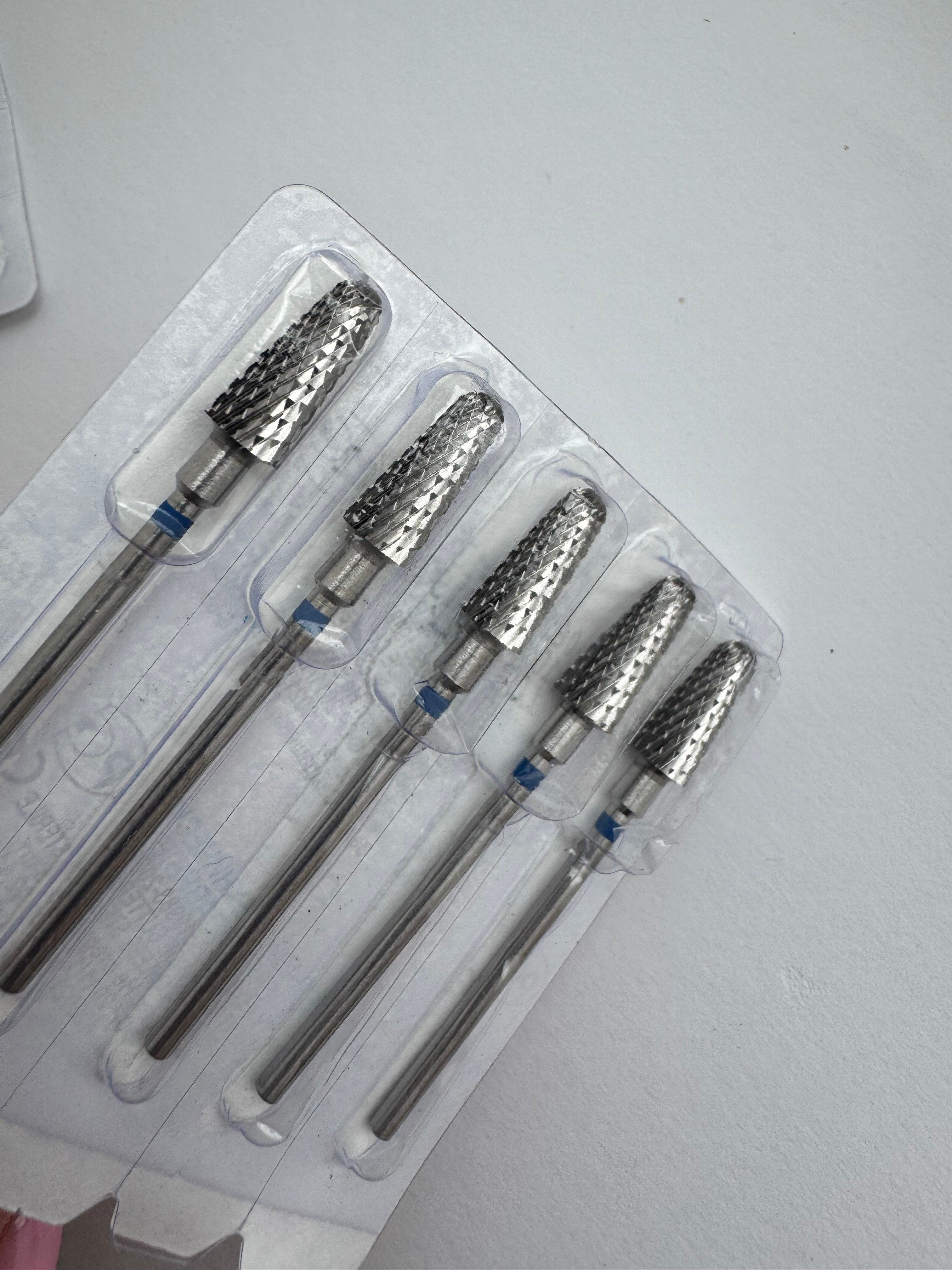 Carbide nail drill bit with a blue ring, ø6.0 mm in size, designed for a universal fit in nail drills and rounded tip for easy maneuvering.