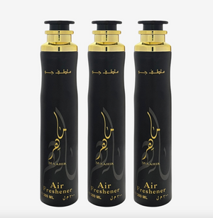 Three Lattafa air fresheners in black bottles with gold caps, labeled 'MAAHIR' with Arabic text.