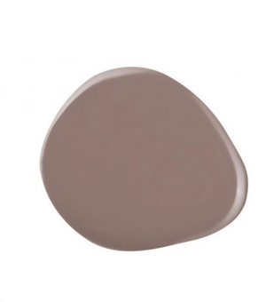 A bottle of Kinetics Shield Professional Gel Polish #610  in the color Quiet confidence, which is a timeless taupe shade.