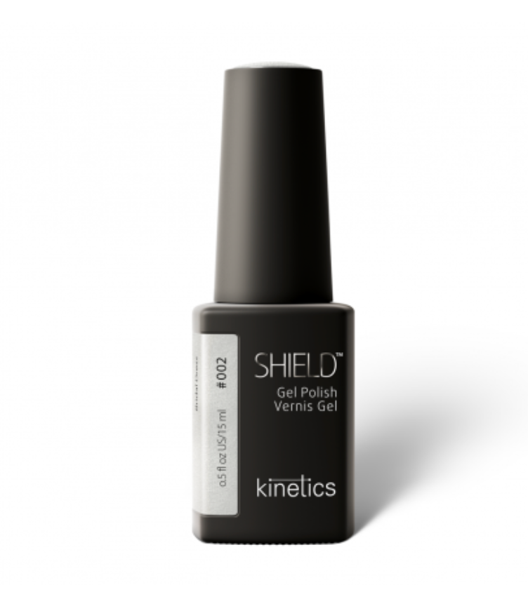 A bottle of SHIELD Gel Polish in a silver pearl effect color, with a label that reads 'KINETICS #002 Bridal dress'. The bottle has a matte black finish and a hand-painted cap.