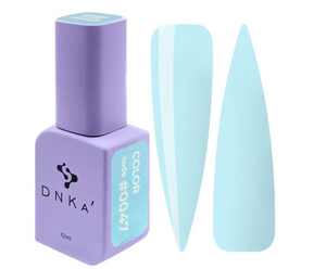 DNKA nail polish bottle with a sample of light blue nail color on a white background