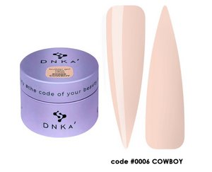 DNKA nail gel with two beige nail forms on a white background