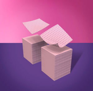 Stacks of white paper with perforated edges on a pink and purple gradient background