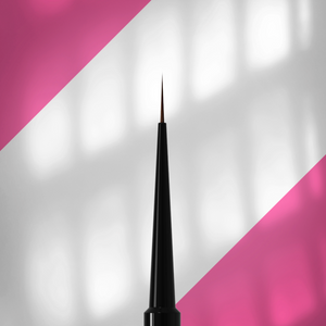 Black eyeliner pen on a pink and white striped background