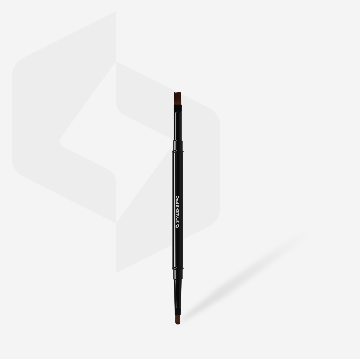 Black makeup brush on a white background