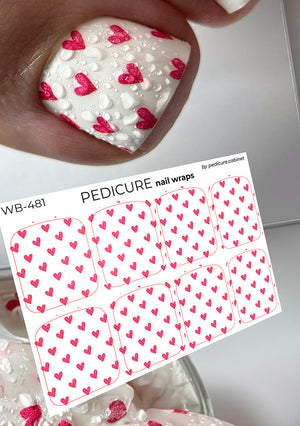 Pedicure nail wraps with pink heart designs on a white background