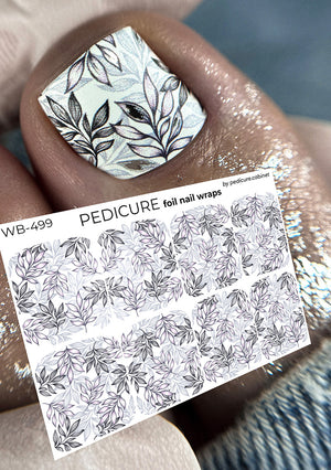 Foil pedicure nail wrap with leaf pattern on a hand, next to packaging labeled 'Pedicure'.