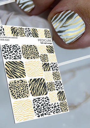 Foil nail wraps with animal print designs and a hand with painted nails displaying similar patterns.