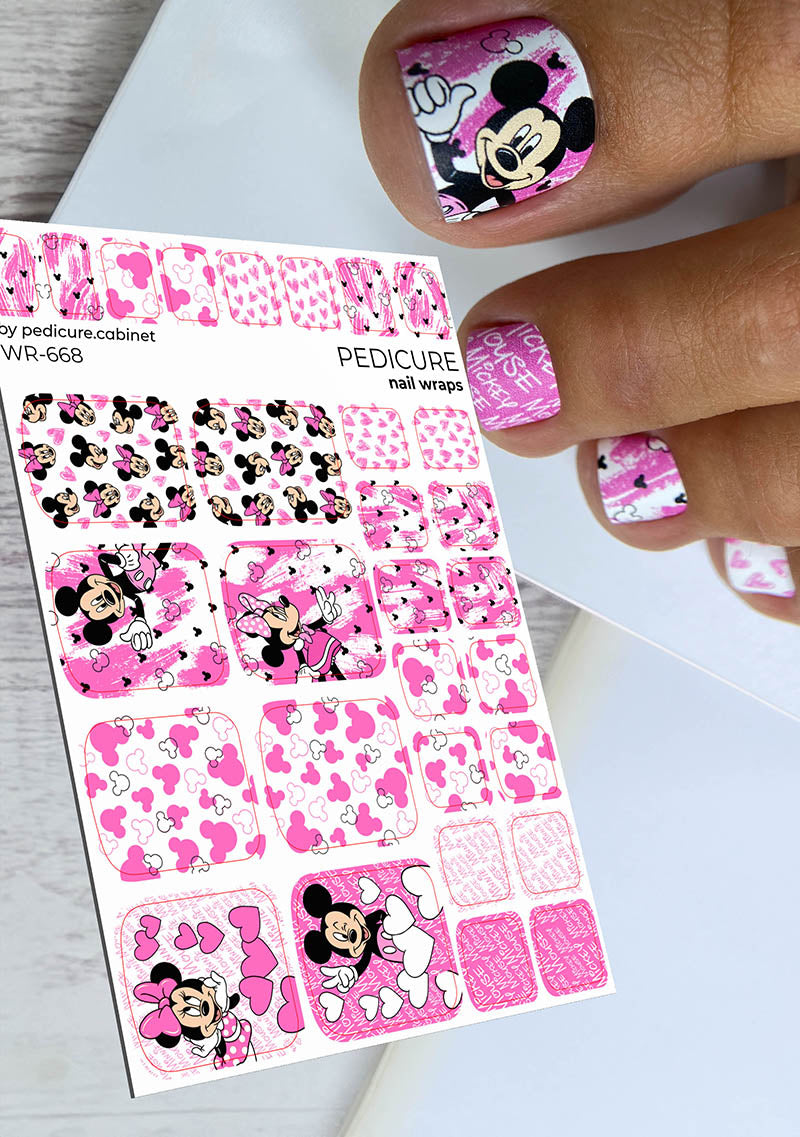 Minnie Mouse nail wraps with a hand displaying nails with similar design.