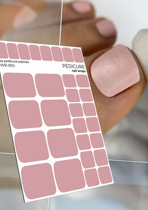 Sheet of pink nail wraps with a close-up of a pedicured toe wearing a pink nail.