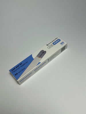 A pack of white disposable nail files with 180 grit, designed for nail care, displayed in its packaging.