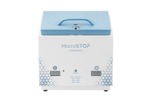 A compact vertical sterilizer machine with a blue lid and digital display, branded Microstop. HIGH TEMPERATURE DRY HEAT STERILIZER MICROSTOP COMPACT