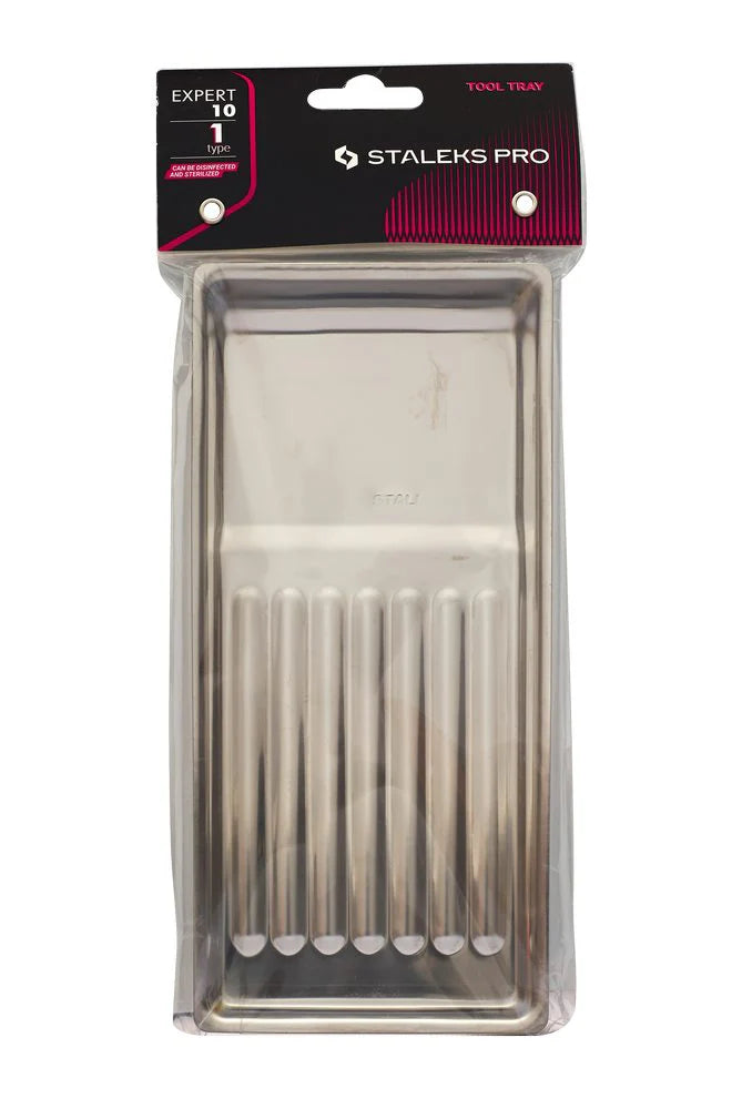 A stainless steel tool tray with undulating bottom designed for easy instrument placement. Tool Tray Expert 10 Type 1