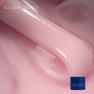 Pink liquid with a small blue container labeled 'TOUCH' on a pink background
