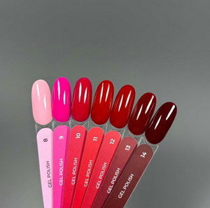 Set of gel polish swatches in various shades on a gray background
