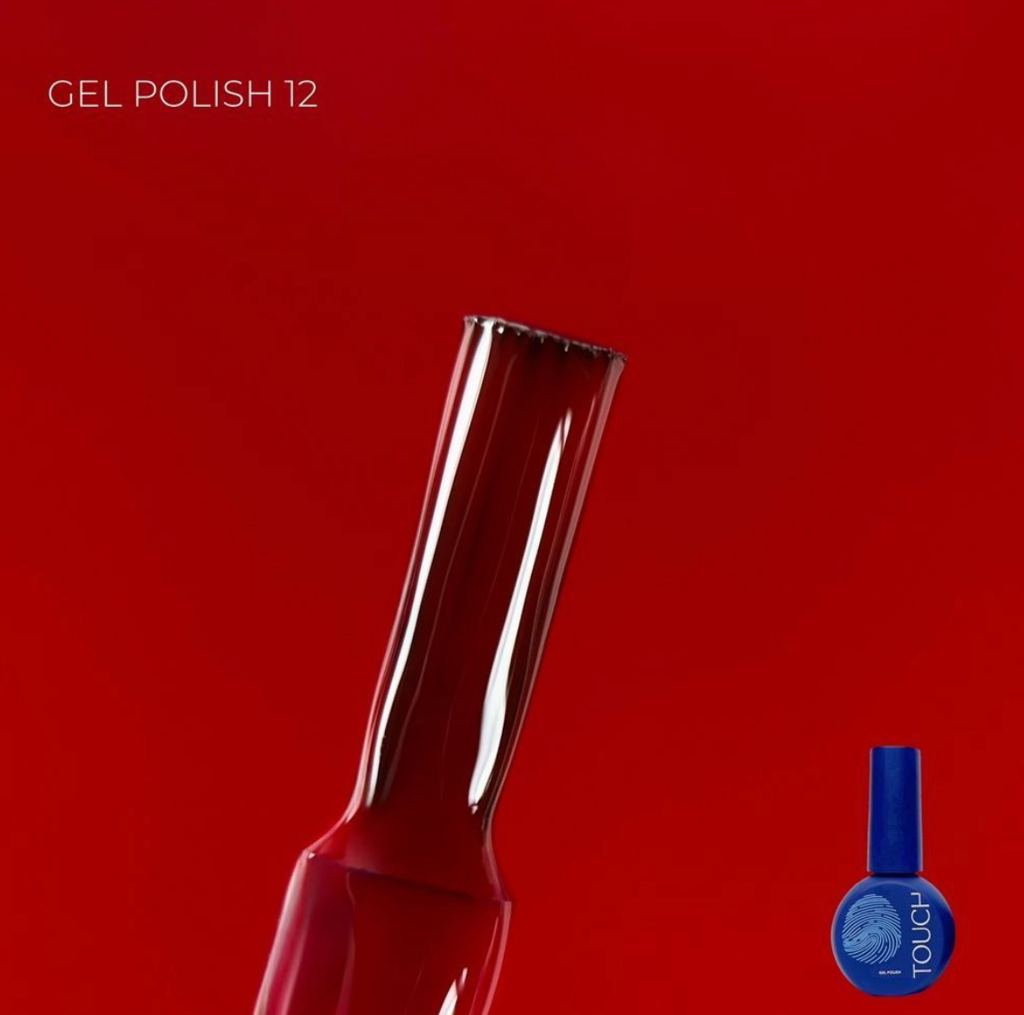 Red gel polish bottle with a smaller blue bottle on a red background