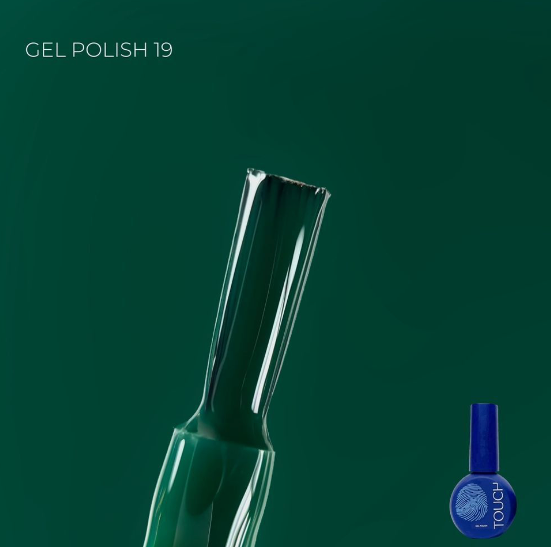 Green gel polish bottle with a smaller blue bottle labeled 'TOUCH' on a dark green background.