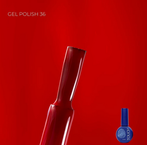 Red gel polish bottle with a smaller blue bottle labeled 'Touch' on a red background