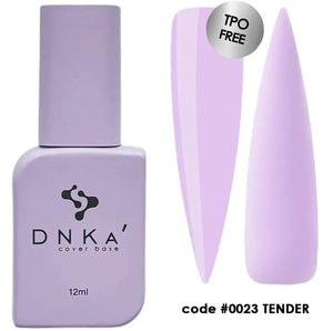A bottle of DNKa' Cover Base #0023 Tender with a purple label and a small, pointed applicator brush. The volume indicated is 12 ml.