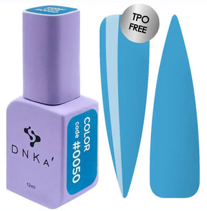 A purple DNKa' Gel Polish bottle with the cap removed, showing the light blue color of the polish, alongside a blue nail polish wedge. A purple-colored DNKa' Gel Polish bottle with the code #0050 and 12 ml volume indicated