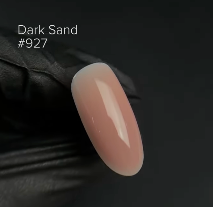 Kinetics ceramic base Dark sand in black bottle on white background