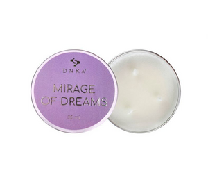 Candle with purple lid labeled 'Mirage of Dreams' by DNKA on a white background