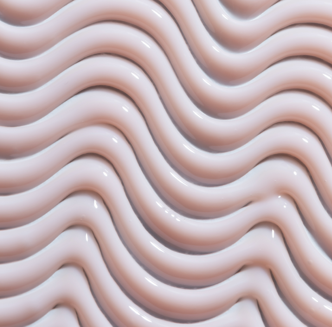 Wavy pattern of beige color on a light background