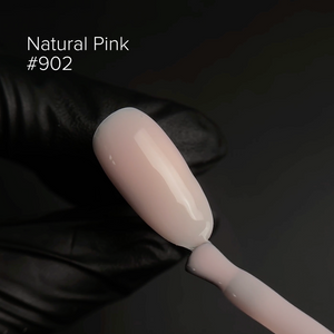 Nail polish brush with a natural pink color swatch labeled '#902' on a dark background.
