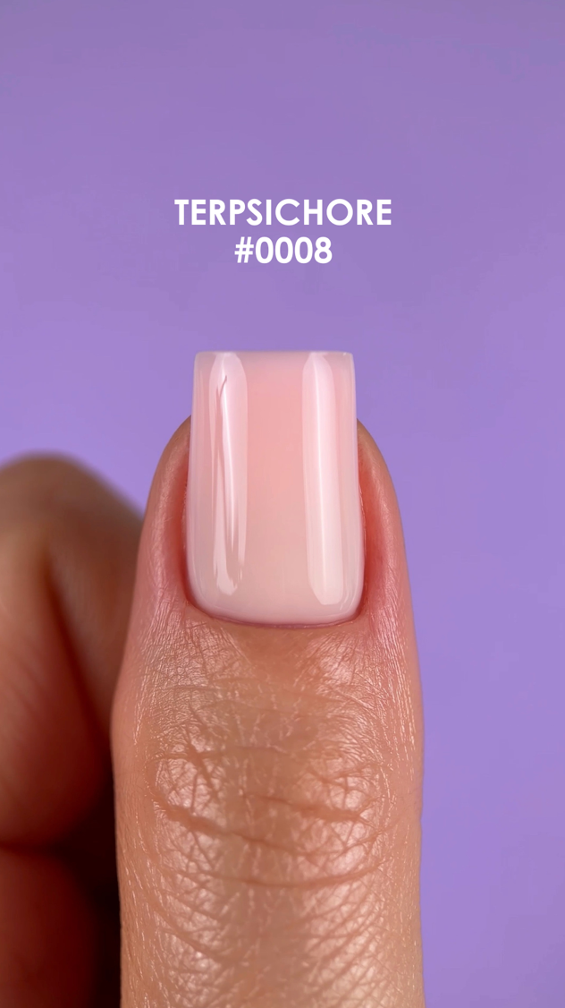 Nail with light pink polish on a purple background, labeled 'TERPSICHORE #0008'.