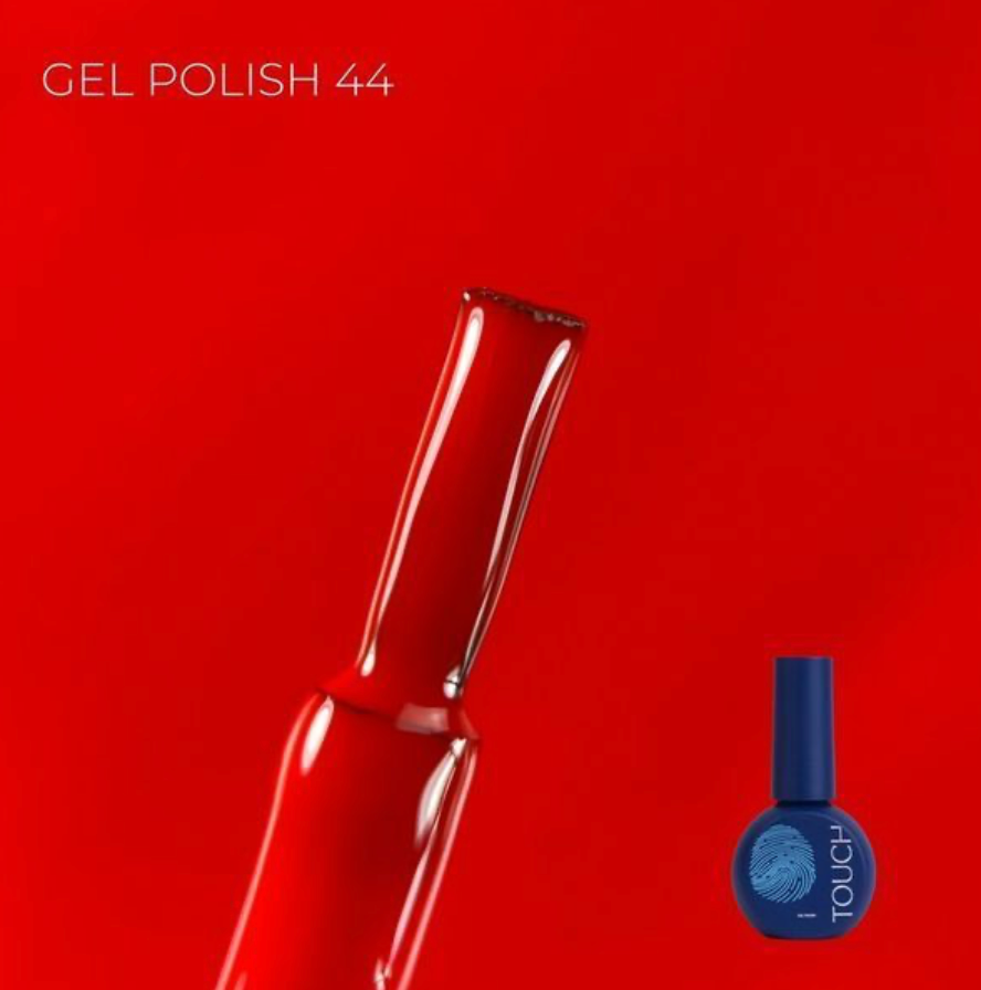 Blue nail polish bottle with a red background, Touch red gel polish