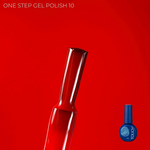 Red nail polish bottle with blue cap on a red background
