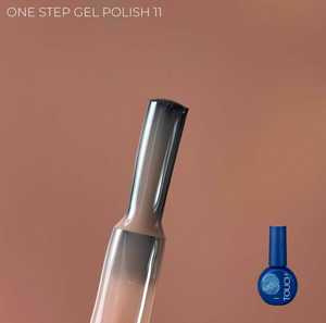 One-step gel polish applicator with a bottle of nail polish on a brown background