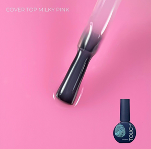 Nail polish bottle with applicator on a pink background