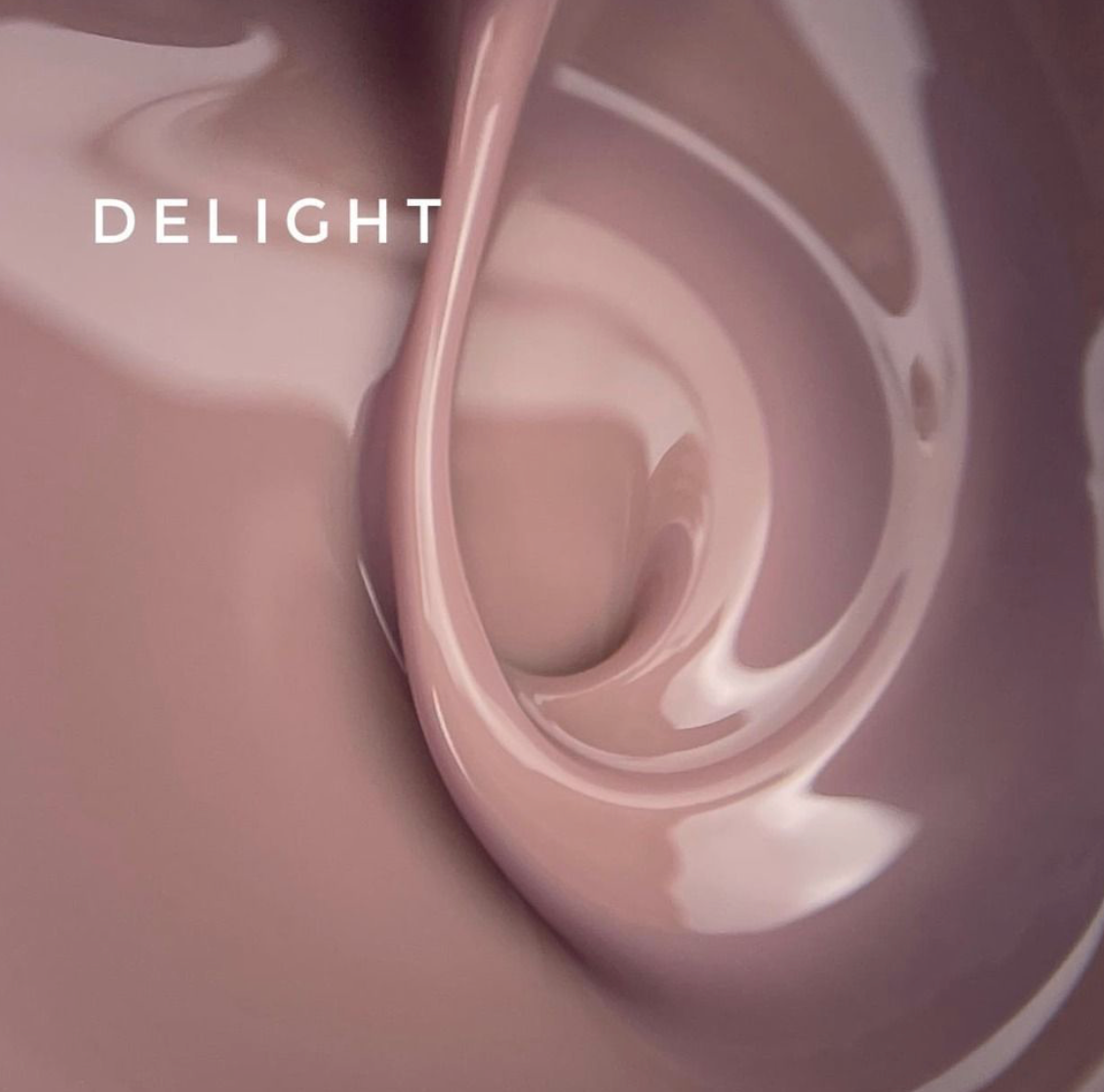 Close-up of swirling chocolate with the word 'Delight' above it