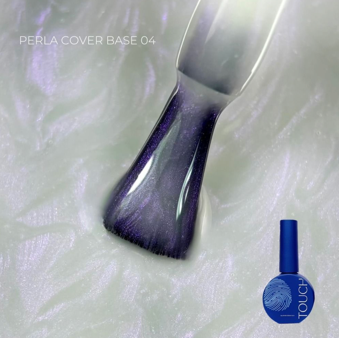 Nail polish brush with purple glitter on a textured white surface, featuring the brand 'TOUG'.