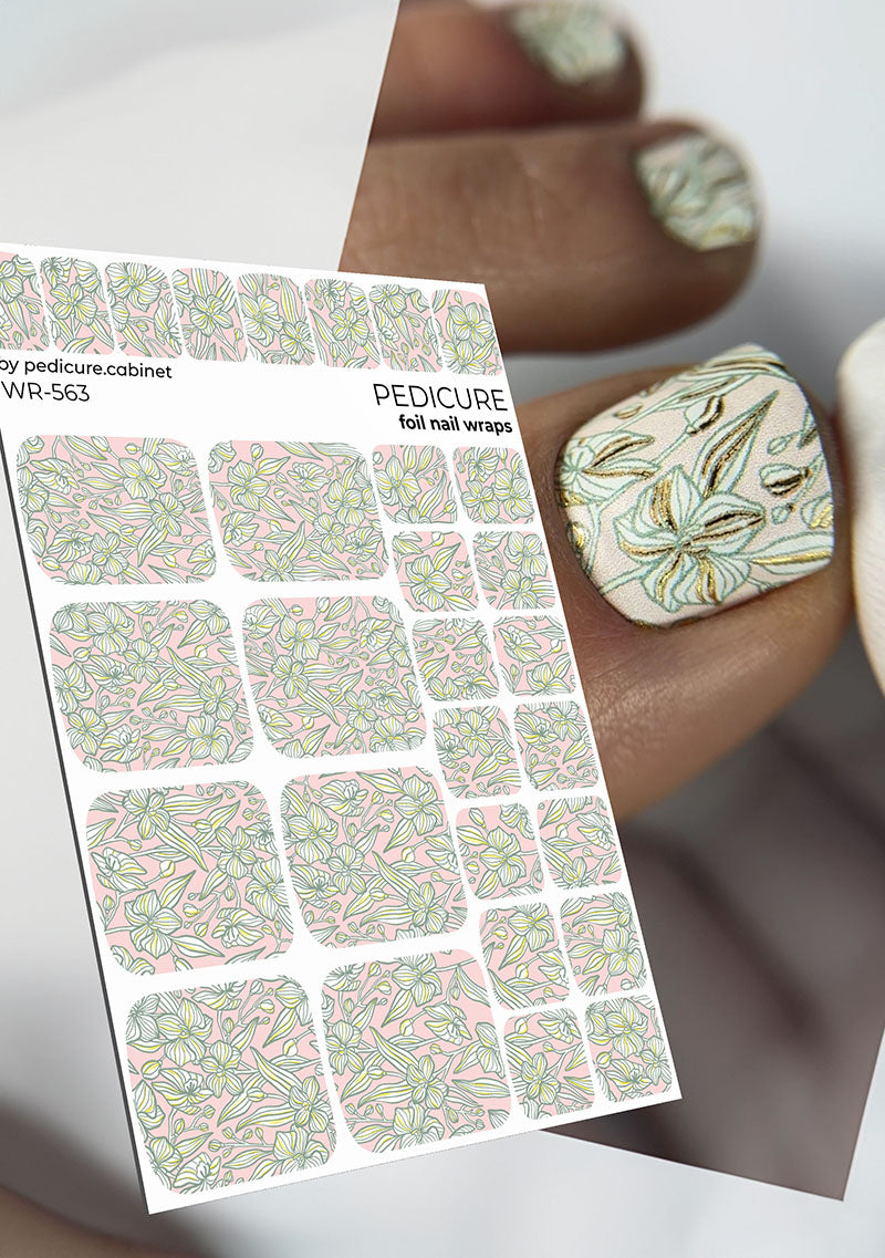 Sheet of pedicure foil nail wraps with a close-up of a decorated nail.