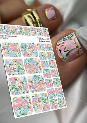 Sheet of floral nail wraps with a hand model displaying a decorated nail.
