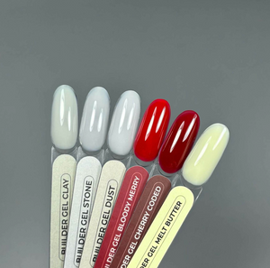 Set of gel nail polish samples with labels on a gray background