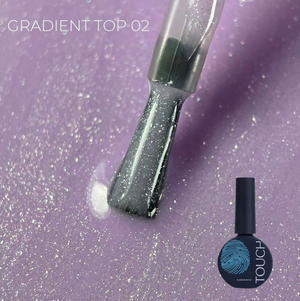 A bottle of gradient top coat nail polish with a brush showing the shimmering finish, set against a sparkling lavender-purple background with the text 'GRADIENT TOP-02'.