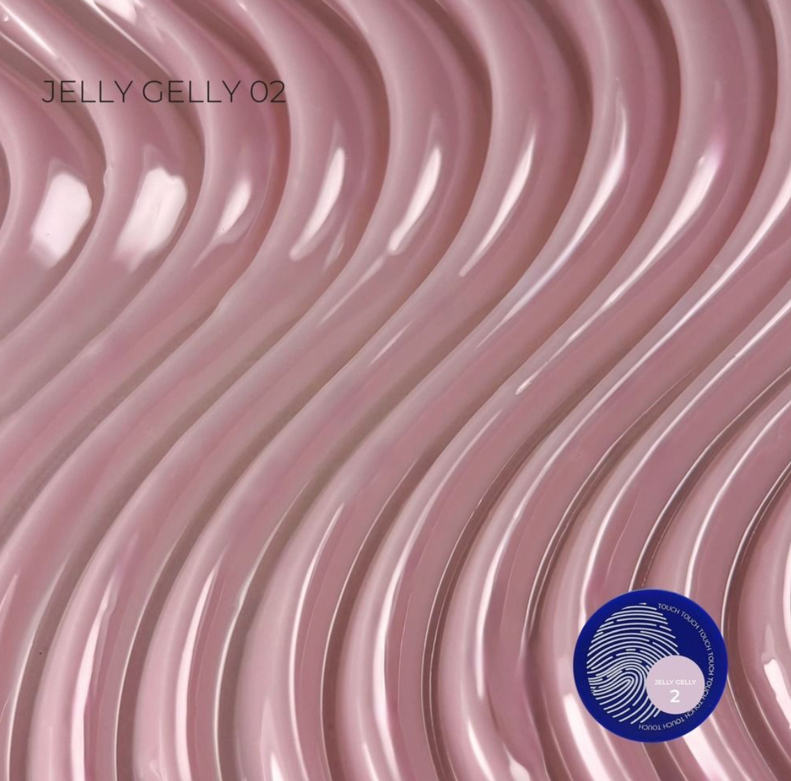 A close-up of a glossy, wavy pink material sample labeled 'JELLY GELLY 02' with a blue circular certification sticker in the lower right corner.