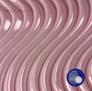 A close-up of a glossy, wavy pink material sample labeled 'JELLY GELLY 02' with a blue circular certification sticker in the lower right corner.