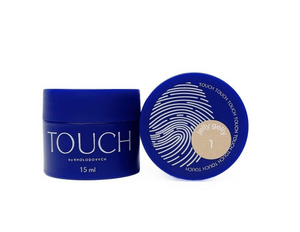 A blue cosmetic jar labeled TOUCH by KENDLODOYTCR with the lid placed beside it, showing a beige circular sample labeled Jelly Jelly 1 on a white background.