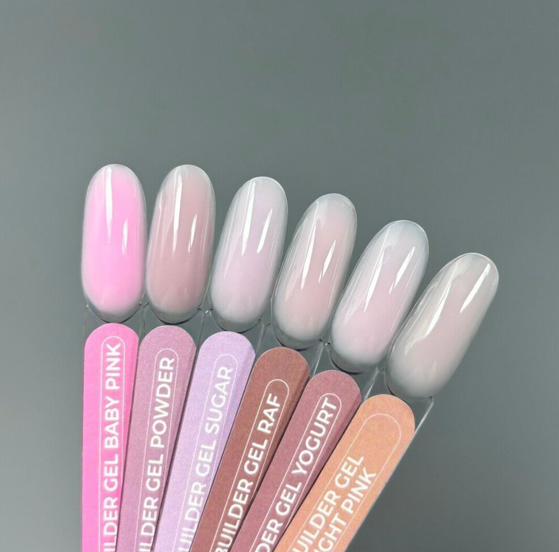 TOUCH Builder Gel Nude swatches in soft pink and light beige tones on gray background