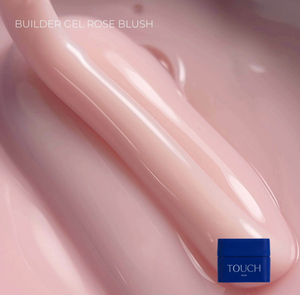 Pink gel with a blue container labeled 'TOUCH' on a pink background